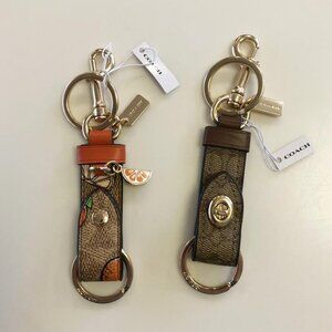 NWT Coach Trigger Snap Bag Charms F49314 + Orange Print CAO46
